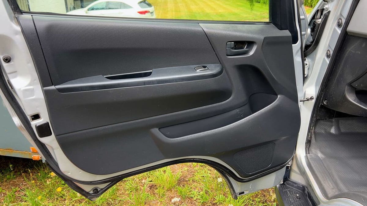 Interior door panel cleaned — after