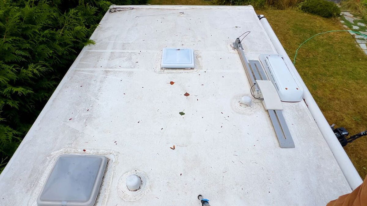Travel trailer roof cleaned — before